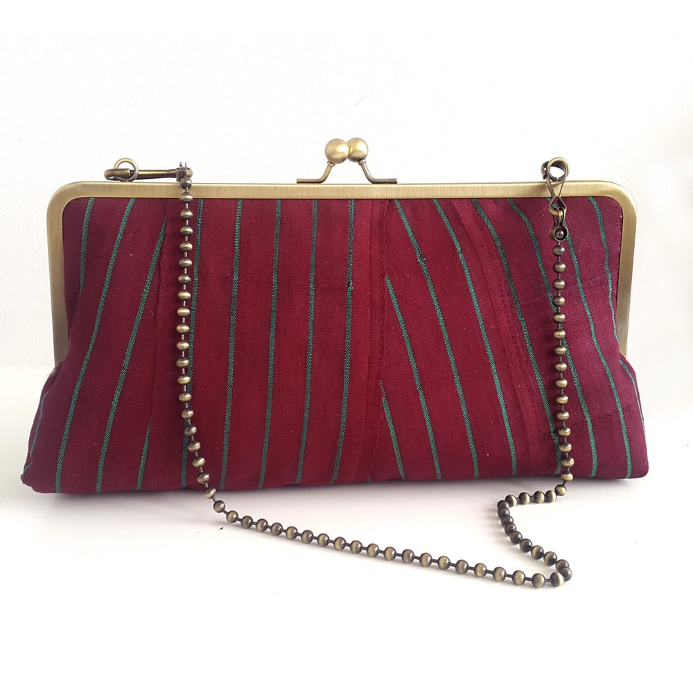 Statement maroon Clutch Purse in Alaari Aso-oke | UrbanknitUrbanknit